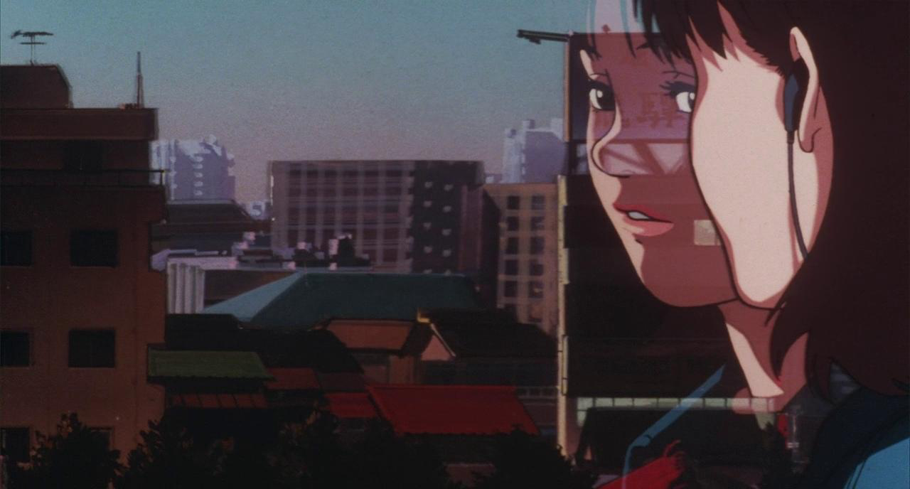Mima looking out at the city, her reflection showing